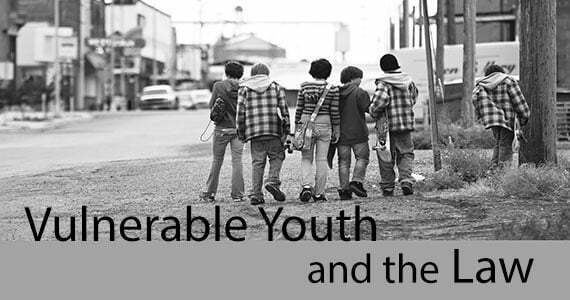 Cover Banner: Vulnerable youth and the law - photo of 5 pre-teens walking along a street