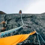 A person climbing a rock face