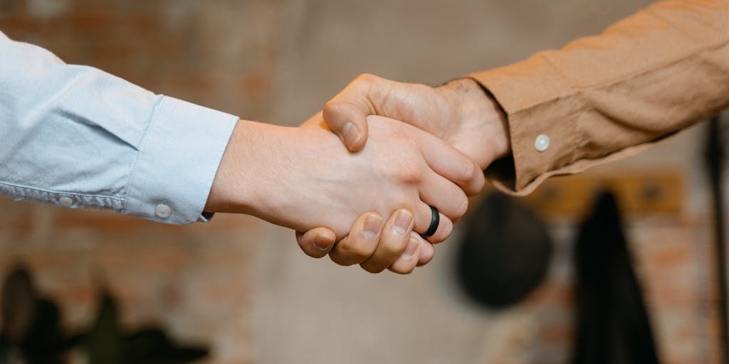 Two people shaking hands