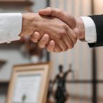 Two people shaking hands